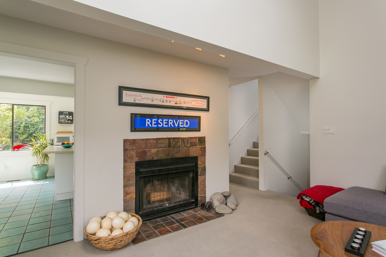 Living room with wood-burning fireplace