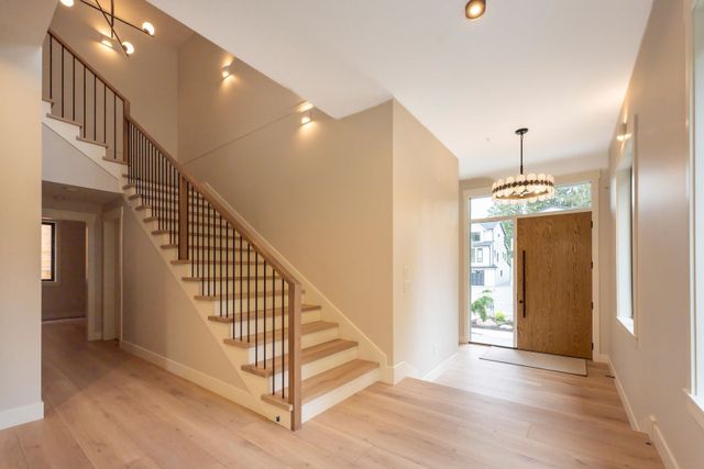 Entrance and staircase to the upper floor at 12853 Sheldrake Court, Silver Valley, Maple Ridge Entrance and staircase to the upper floor at 12853 Sheldrake Court, Silver Valley, Maple Ridge