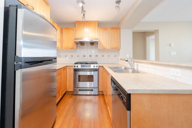 2958-whisper-way-westwood-plateau-coquitlam-02 at 301 - 2958 Whisper Way, Westwood Plateau, Coquitlam