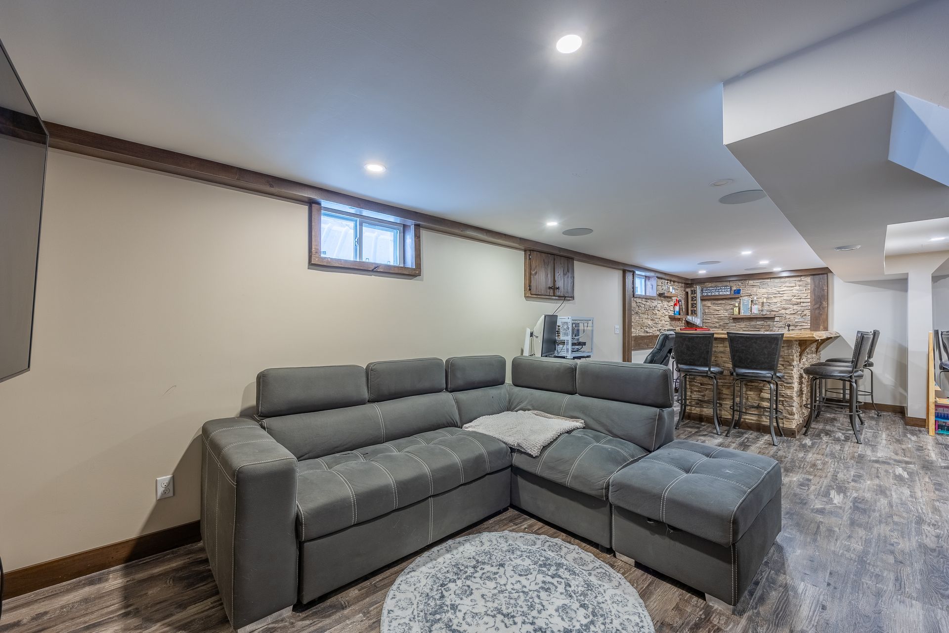 Living area featuring finished floors, recessed lighting, and bar at 5 Bint Avenue, Simcoe Living area featuring finished floors, recessed lighting, and bar at 5 Bint Avenue, Simcoe