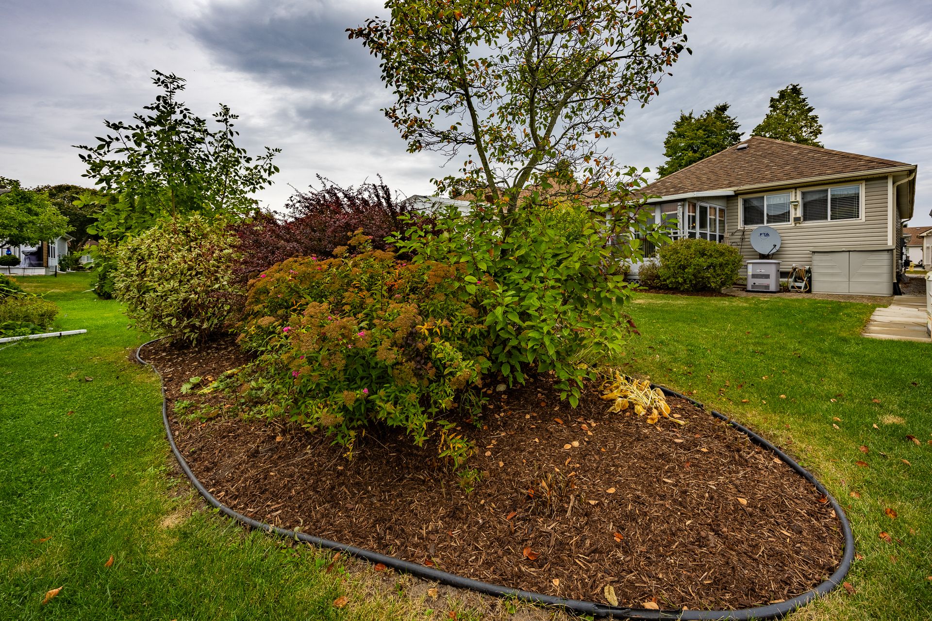 Back yard at 4 Walsingham Drive, Village of Long Point Bay, Port Rowan Back yard at 4 Walsingham Drive, Village of Long Point Bay, Port Rowan