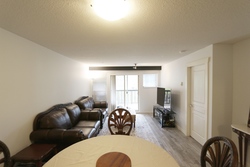 Living room at 214 - 2988 Silver Springs Boulevard, Westwood Plateau, Coquitlam