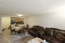 Living room at 214 - 2988 Silver Springs Boulevard, Westwood Plateau, Coquitlam