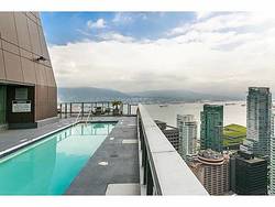 Outdoor pool with mountain view at 3804 - 1189 Melville, Coal Harbour, Vancouver West