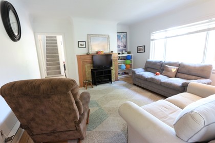 Living room at 6305 St Catherines, South Vancouver, Vancouver East
