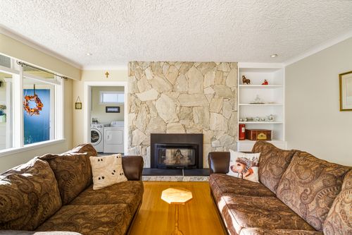 Living room fireplace at 715 Kilkeel Place, Delbrook, North Vancouver