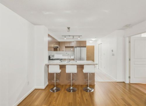 Kitchen with Wet Bar - AI Staged at 110 - 9399 Tomicki Avenue, West Cambie, Richmond