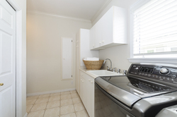 Laundry room with great storage at 1178 West 42nd Avenue, South Granville, Vancouver West Laundry room with great storage at 1178 West 42nd Avenue, South Granville, Vancouver West