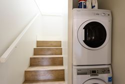 Shared laundry between main and lower suites at 1003 Semlin Drive, Grandview Woodland, Vancouver East Shared laundry between main and lower suites at 1003 Semlin Drive, Grandview Woodland, Vancouver East