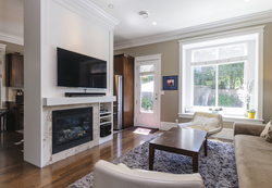 Large feature window overlooks the back garden at 876 West 23rd Avenue, Cambie, Vancouver West