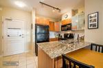 Kitchen with granite counter at 302 - 4078 Knight Street, Knight, Vancouver East
