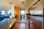 Stainless steel appliances and direct access to covered deck at 501 - 306 Sixth Street, Uptown NW, New Westminster
