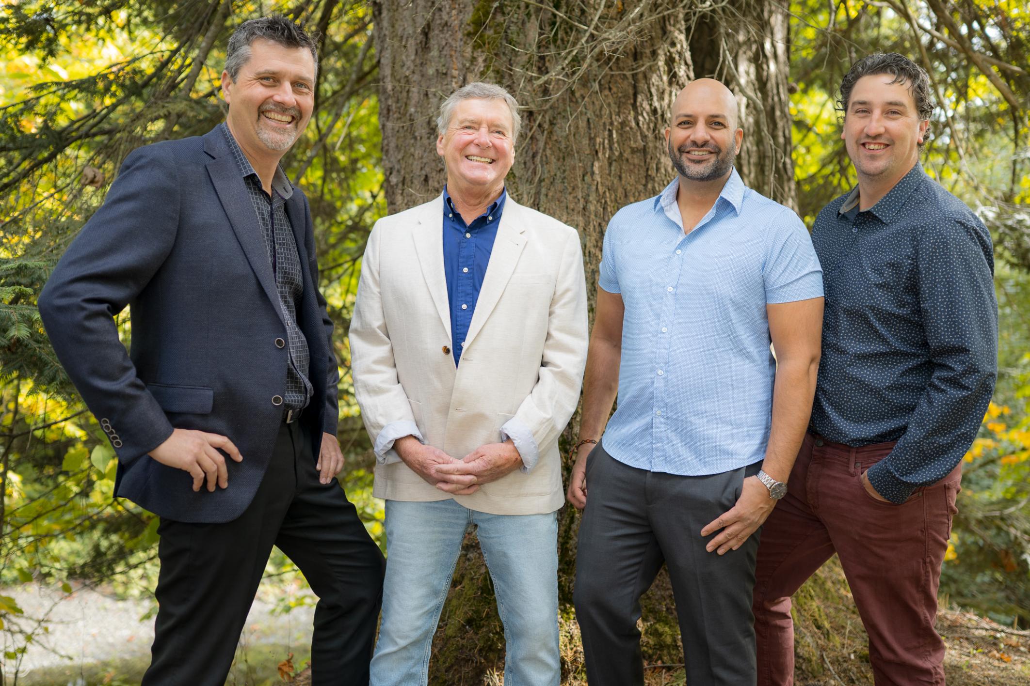 Dave Koszegi Group real estate agents standing together outdoor