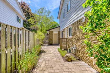 Side Yard Patio - 165 Arichat Rd., Oakville at 165 Arichat Road, 1006 - FD Ford, Oakville