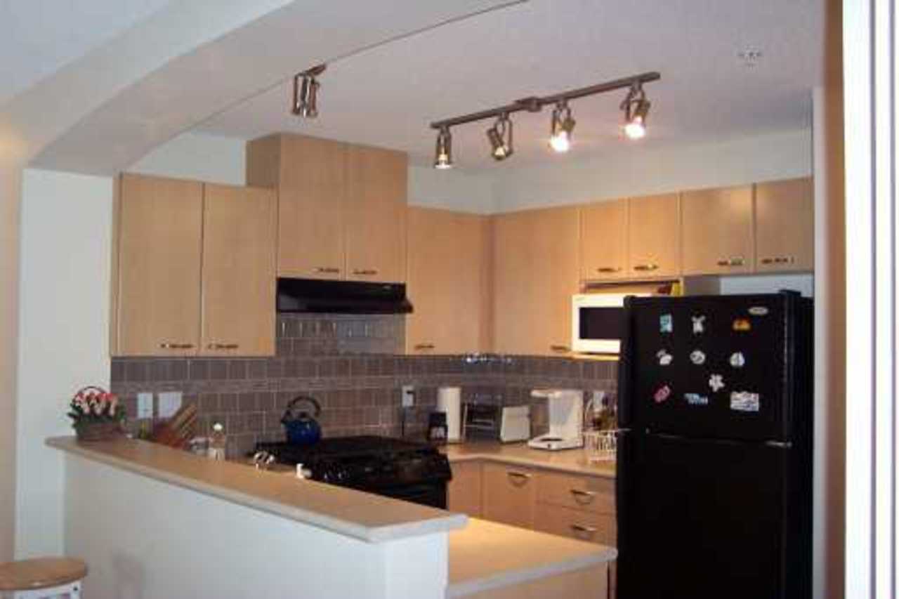 Kitchen at 415 - 2958 Silver Springs Blvd, Coquitlam Center, Coquitlam