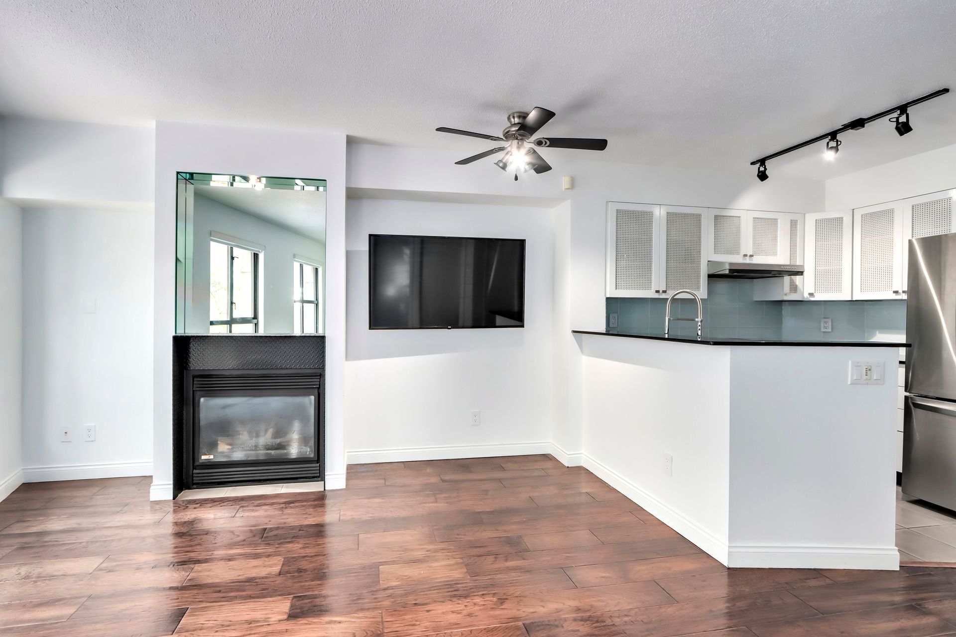 Gas Fireplace in Open Concept Living Room at 201 - 55 Alexander Street, Downtown VE, Vancouver East Gas Fireplace in Open Concept Living Room at 201 - 55 Alexander Street, Downtown VE, Vancouver East