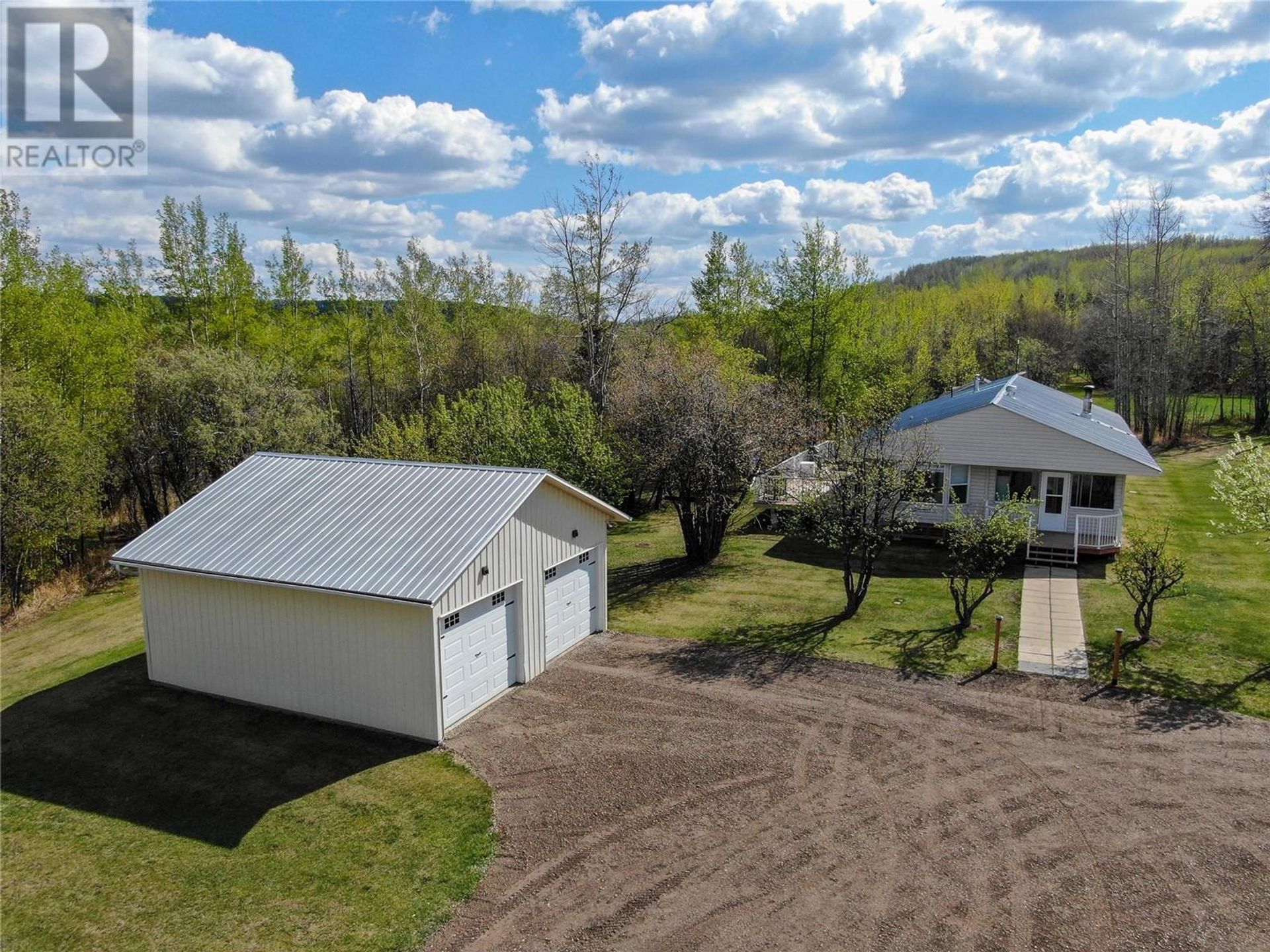 13105 Mckinnon Subdivision, Dawson Creek  by Jessica Kulla Personal Real Estate Corp 13105 Mckinnon Subdivision, Dawson Creek