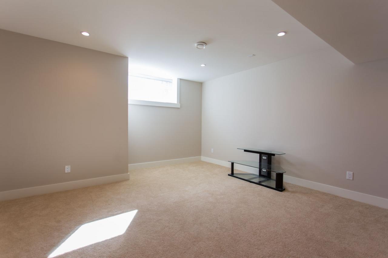 Living Room Area in Basement  of 3373 Carmelo Av., Burke Mountain, Coquitlam