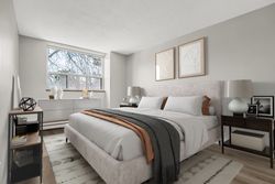Primary Bedroom Virtually Staged at 209 - 20 Sunrise Avenue, Victoria Village, Toronto