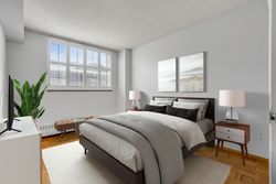 Primary Bedroom Virtually Staged at 405 - 1801 O'connor Drive, Victoria Village, Toronto