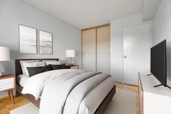 Primary Bedroom Virtually Staged at 405 - 1801 O'connor Drive, Victoria Village, Toronto