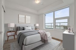 Primary Bedroom Virtually Staged at 410 - 7439 Kingston Road, Rouge E11, Toronto