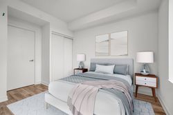 Primary Bedroom Virtually Staged at 410 - 7439 Kingston Road, Rouge E11, Toronto