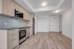 Kitchen & Dining Room at 410 - 7439 Kingston Road, Rouge E11, Toronto
