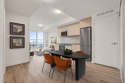 Kitchen & Dining Room Virtually Staged at 410 - 7439 Kingston Road, Rouge E11, Toronto