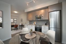 Kitchen & Den Virtually Staged at 325 - 2301 Danforth Avenue, East End-Danforth, Toronto