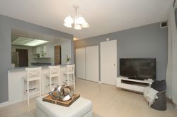 Family Room at 202 - 3131 Bridletowne Circle, L\'Amoreaux, Toronto
