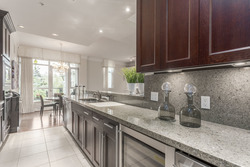 Chef's kitchen - updated granite countertops at 708 - 4685 Valley Drive, Quilchena, Vancouver West