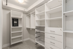 Large walk-in closet off the Master Bedroom with built in safe at 708 - 4685 Valley Drive, Quilchena, Vancouver West