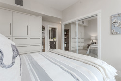 Built In storage drawers and large clothes closet in 2nd bedroom at 708 - 4685 Valley Drive, Quilchena, Vancouver West