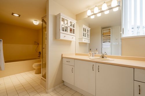 Ensuite vanity with loads of storage at 301 - 2203 Bellevue Avenue, Dundarave, West Vancouver