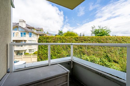 Balcony off primary bedroom with northern mountain views at 301 - 2203 Bellevue Avenue, Dundarave, West Vancouver