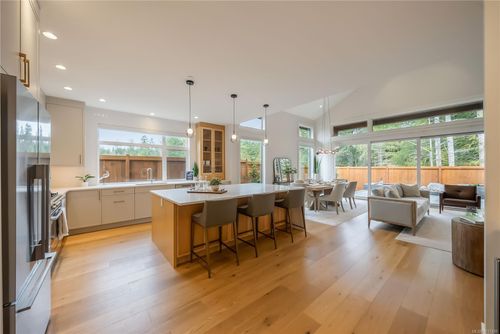 Kitchen and entertainment areas at 530 Hole-in-one Drive, Out of Town