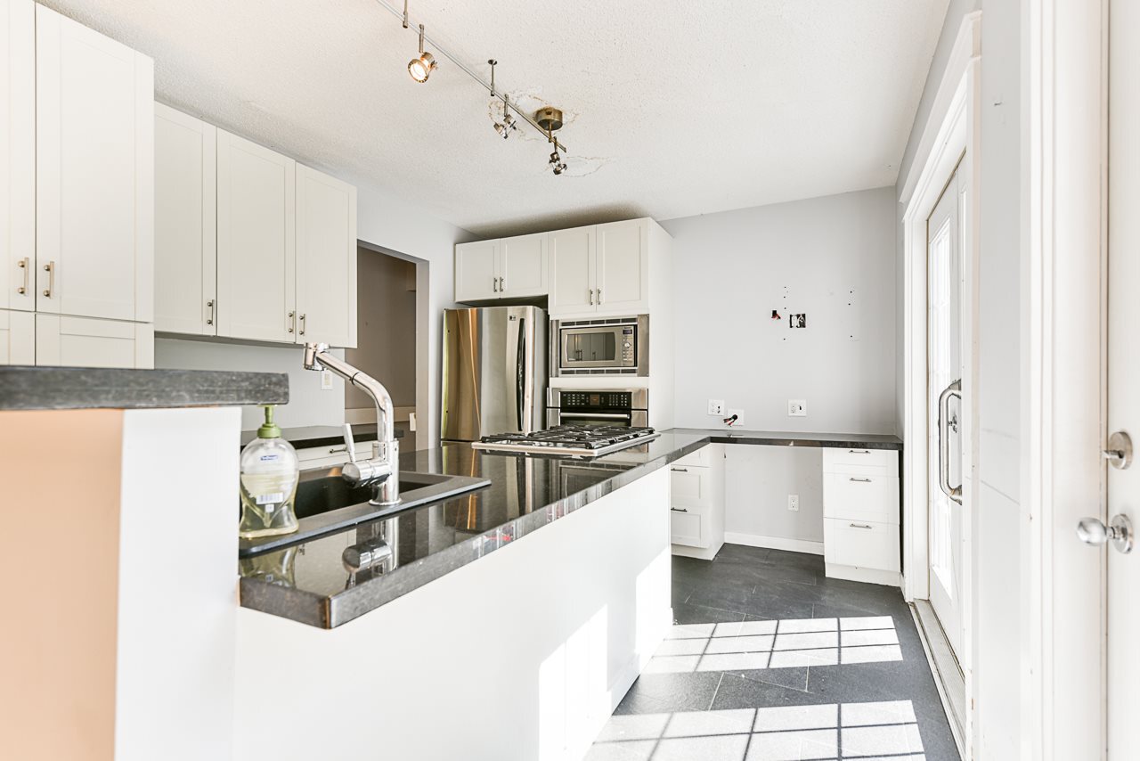 4445-cove-cliff-rd-kitchen at 4445 Cove Cliff Road, Deep Cove, North Vancouver
