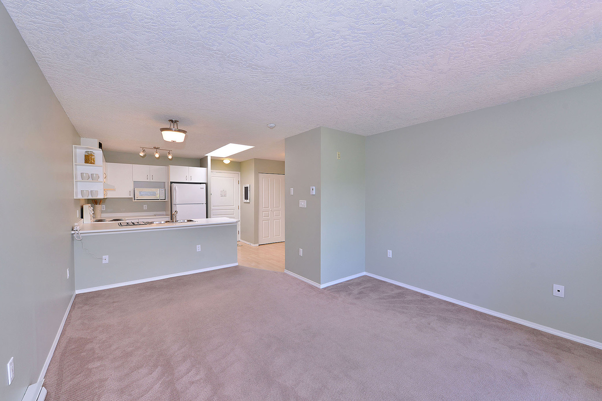 Open Concept Living Room at 304 - 3180 Albina Street, Tillicum, Saanich West