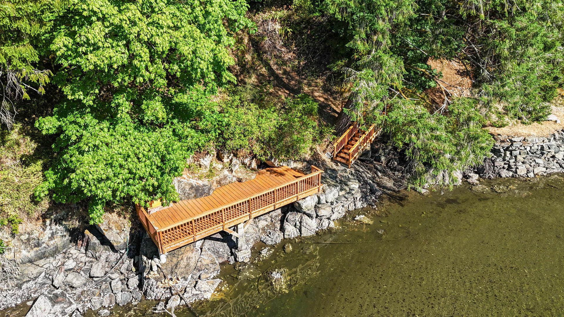 Launch your kayaks or paddleboards from the waterfront deck at 1709 Falcon Heights Road, Goldstream, Langford