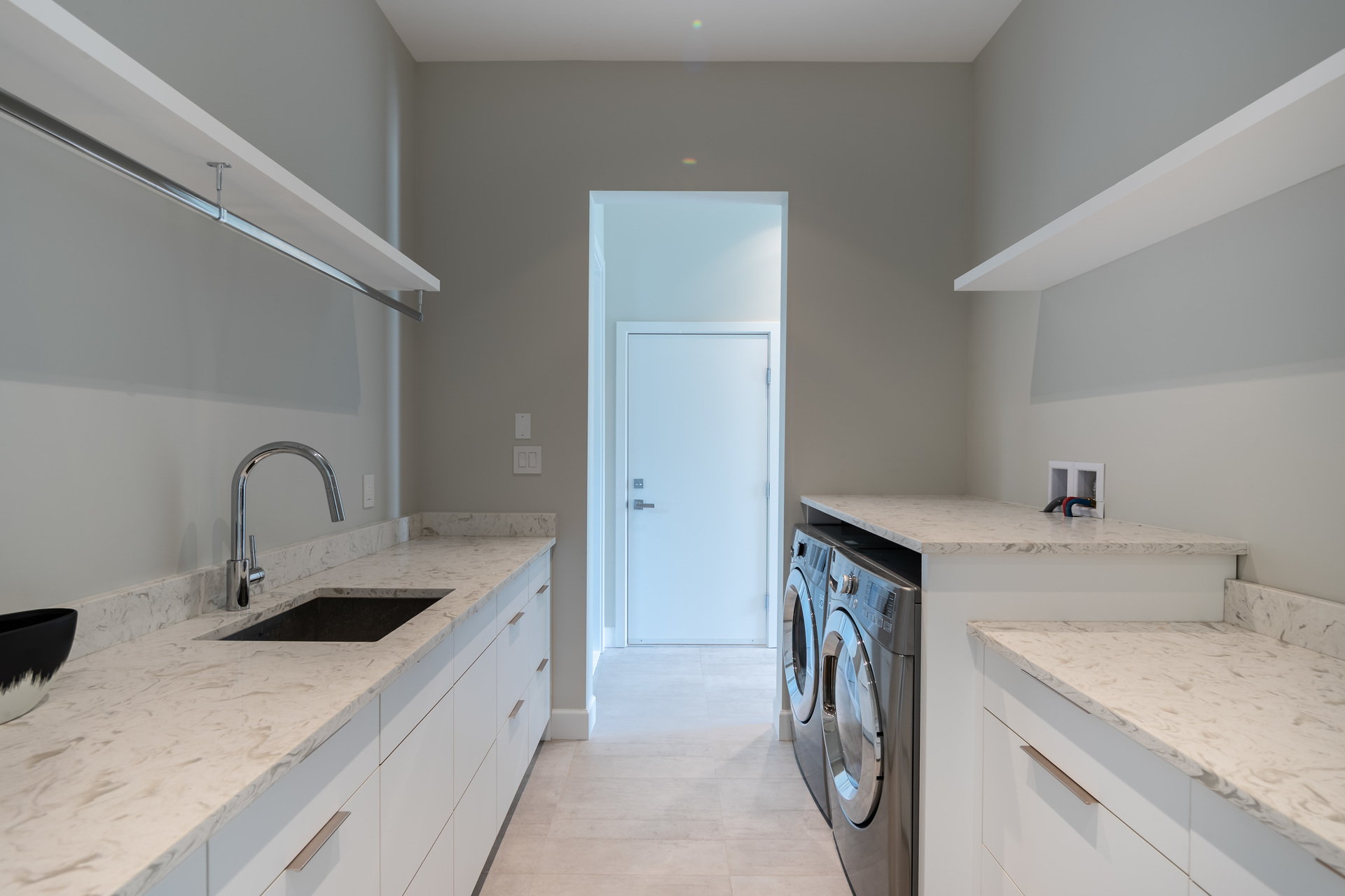 Laundry Area/Access To Secondary Suite & Finished Triple Garage at 5100 & 5101 Jagtar's Way, Prospect Lake, Saanich West Laundry Area/Access To Secondary Suite & Finished Triple Garage at 5100 & 5101 Jagtar's Way, Prospect Lake, Saanich West