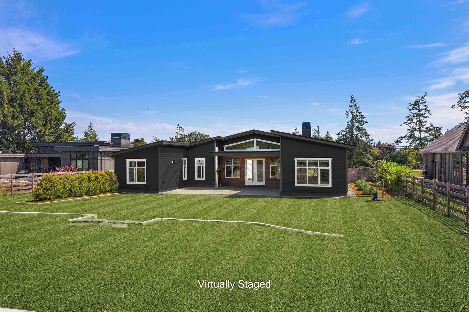 Consider dark paint for a striking exterior refresh. at 846 Birch Road, Deep Cove, North Saanich