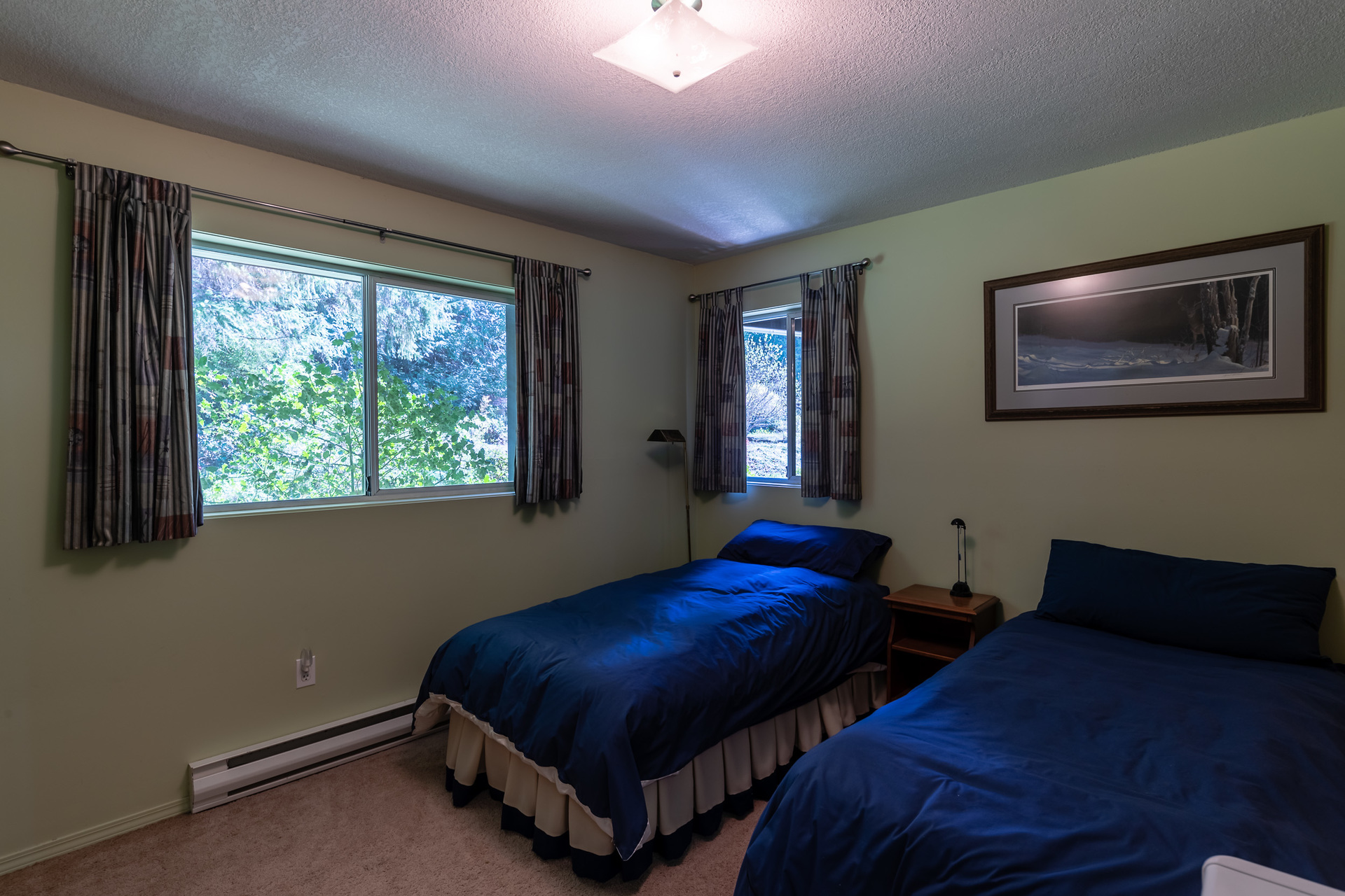 Lower Guest Suite Bedroom at 5101 Island Highway West, Qualicum North, Oceanside Lower Guest Suite Bedroom at 5101 Island Highway West, Qualicum North, Oceanside