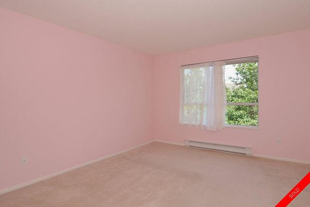 badge_image3 at 311 - 5556 201a Street, Langley City, Langley