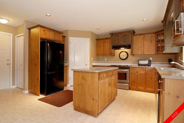 badge_image9 at 9396 203rd Street, Walnut Grove, Langley