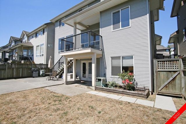 badge_image at 7886 169th Street, Bear Creek Green Timbers, Surrey