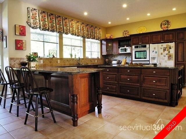 badge_image3 at 12633 55a Avenue, Panorama Ridge, Surrey