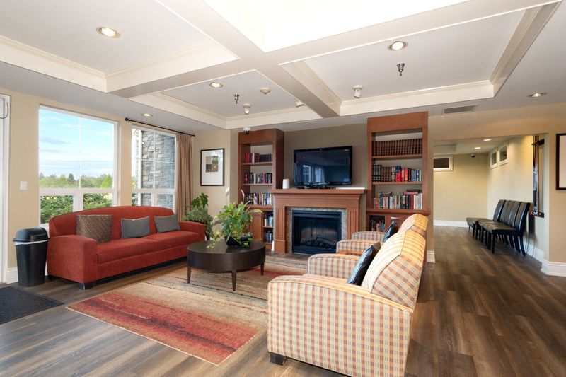 063 at 409 - 19677 Meadow Gardens Way, North Meadows PI, Pitt Meadows