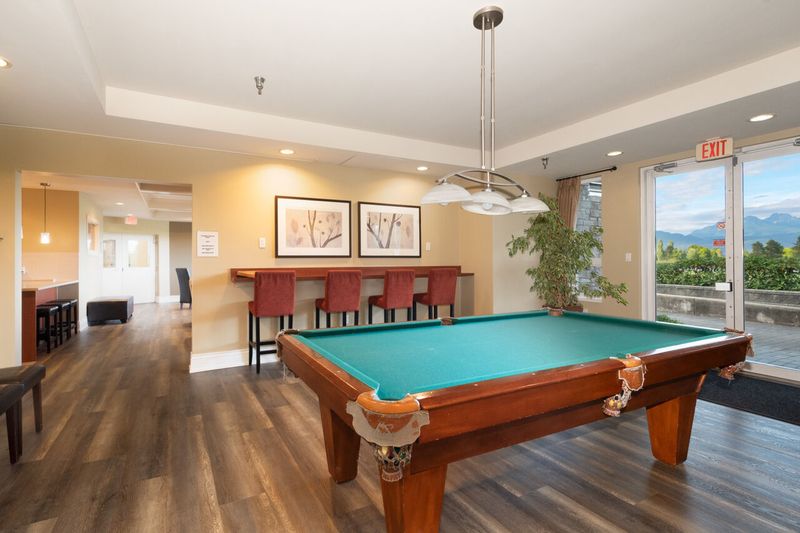 065 at 409 - 19677 Meadow Gardens Way, North Meadows PI, Pitt Meadows