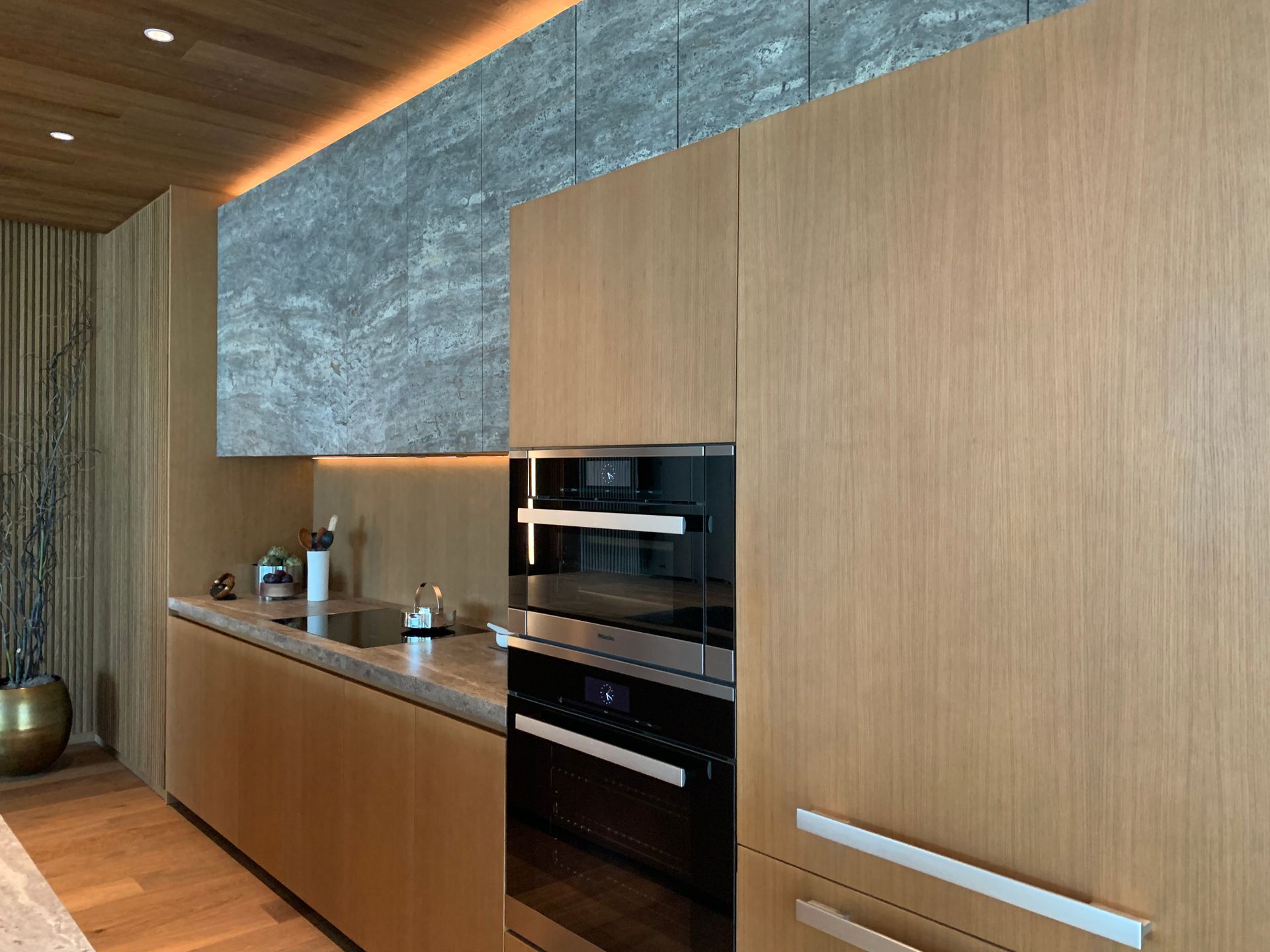1515 dada molteni kitchen in natural with travertine upper cabinets at 1515 Alberni Street Street, Coal Harbour, Vancouver West 1515 dada molteni kitchen in natural with travertine upper cabinets at 1515 Alberni Street Street, Coal Harbour, Vancouver West
